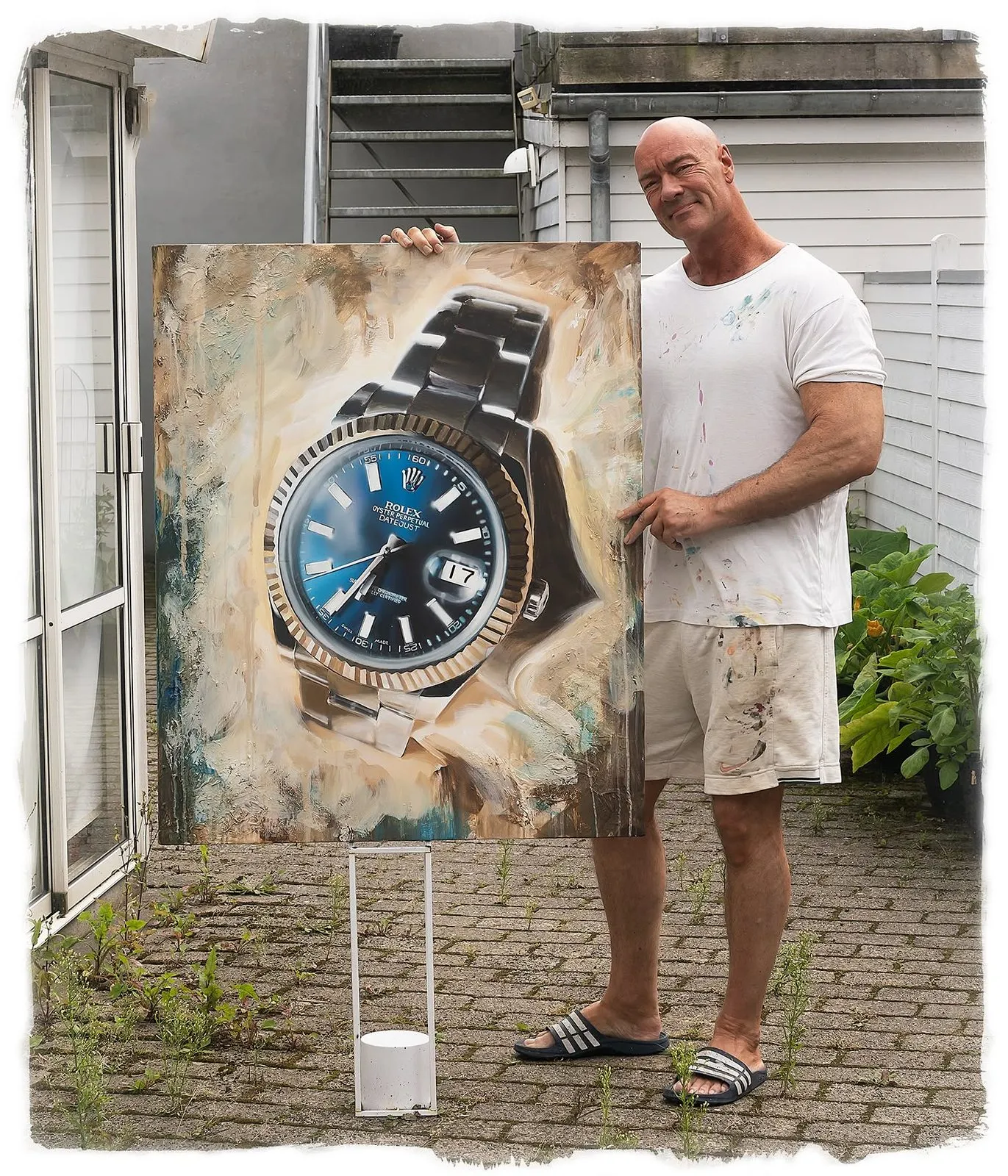 Ib Beier med et fotorealistisk maleri af et armbåndsur